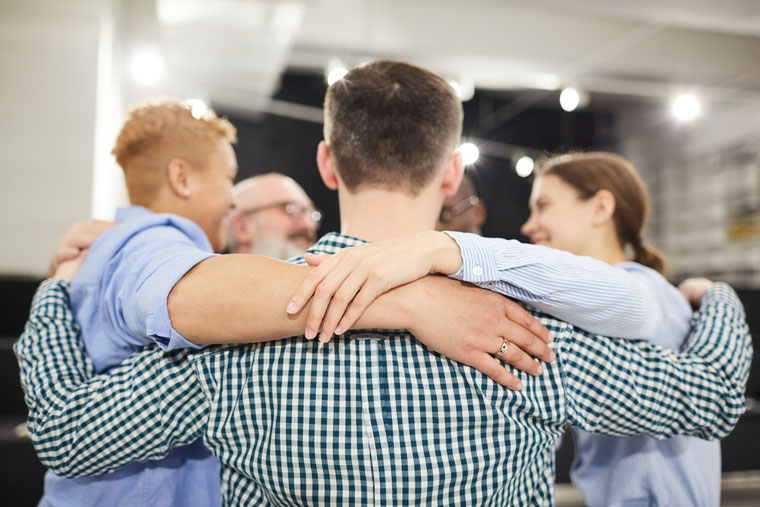 a group of people hugging